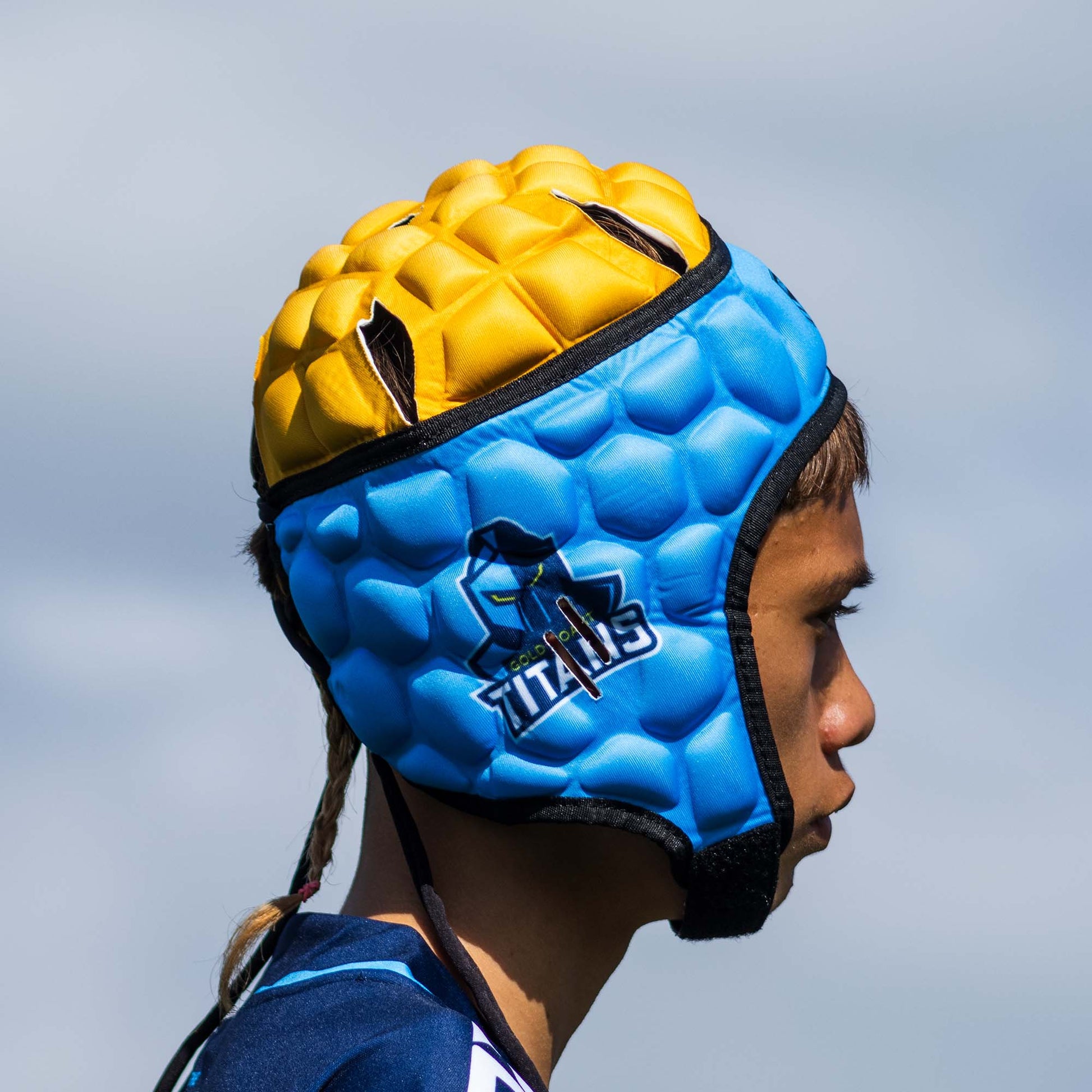 Official NRL Headgear, Gold Coast Titans, lifestyle image, side.