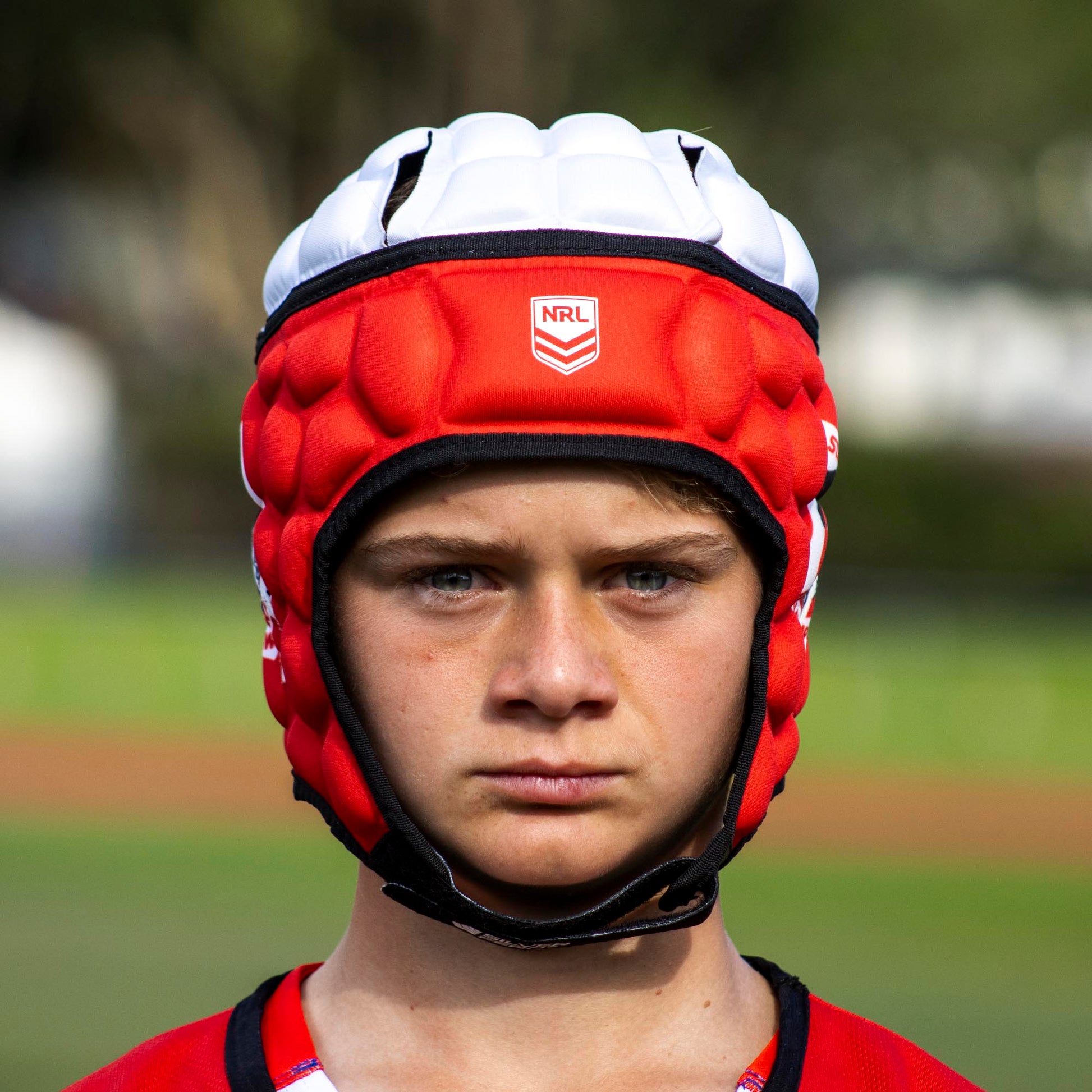 Official NRL Headgear, St. George Illawarra Dragons, lifestyle image, front.