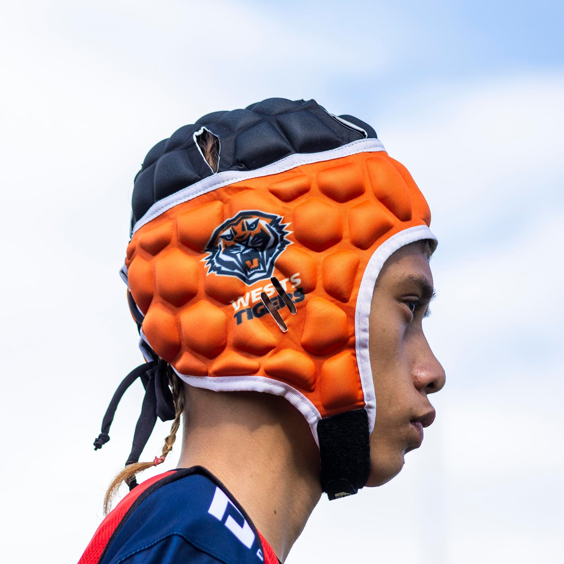 Official NRL Headgear, Wests Tigers, lifestyle image, side.