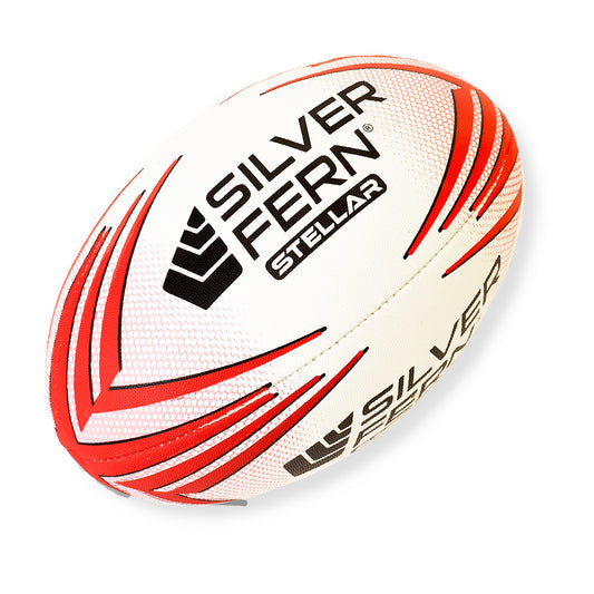 White rugby ball with red and black patterns and 'Silver Fern' branding on a white background